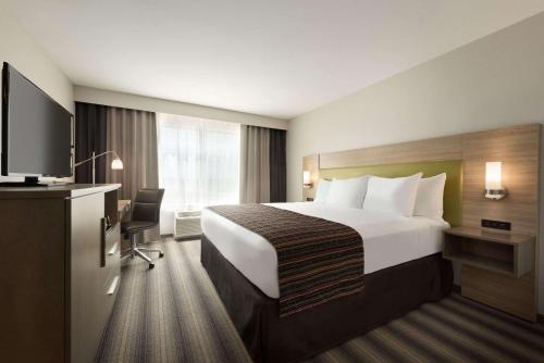 Country Inn & Suites by Radisson, Indianola, IA