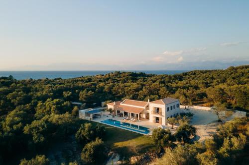 Stone villa situated in the heart of an impressive estate, in one of the most scenic and secluded parts of Corfu’s northeast iconic Mediterranean coastline. - Best Hotels in Corfu